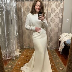 NEW WEDDING DRESS. Never worn.